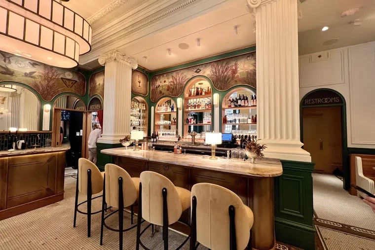 The bar at Enswell, 1528 Spruce St. It replaces a Rival Bros. cafe in the Touraine. A fifth seat was added after this photograph was taken.