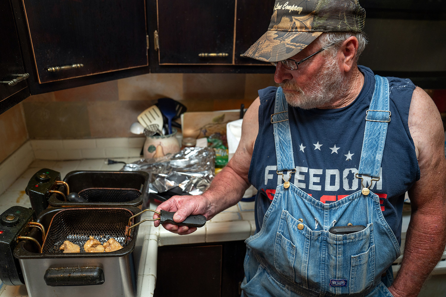 [Titre du site] 24 Photos fascinantes de la trotlinlation du poisson-chat, un art mourant dans le sud